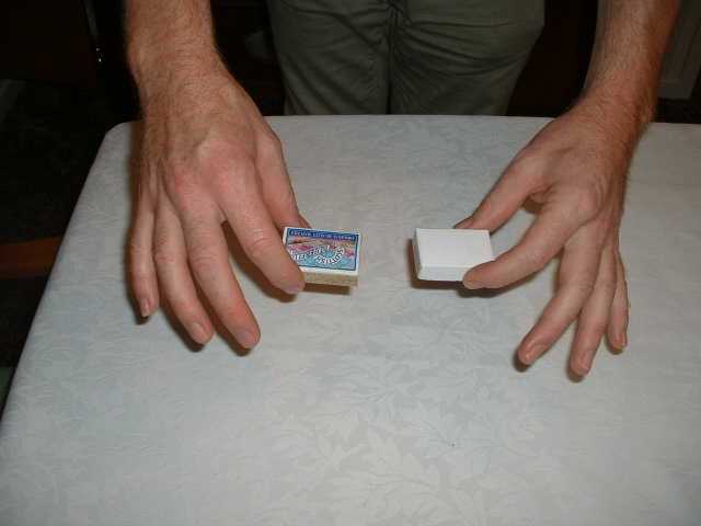 Turn box upside down and pull out drawer.