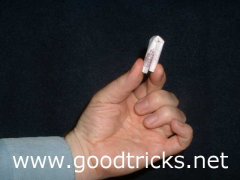 Bend the note back on itself so that the ends touch. Do this in one direction and then the other.