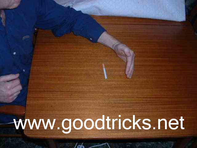 Cup hand in front of cigarette and blow gently into hand which should make the cigarette come back to you.