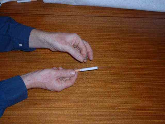Obtain a cigarette and a paperclip