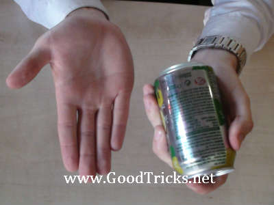 Magician's hand is shown to be empty.