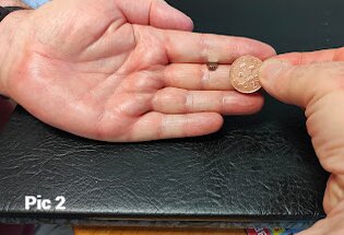 Coin trick demonstration.