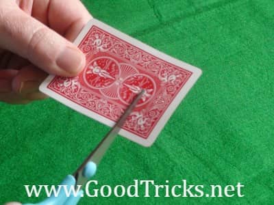 Image showing preparation of playing card for card illusion trick.