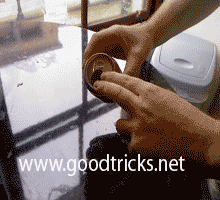 Cut out black paper ring pull shape and stick on top of soda can.