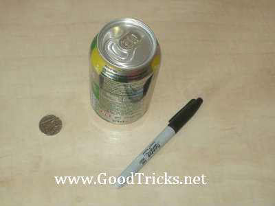 Materials needed to perform this cool coin through can magic trick.