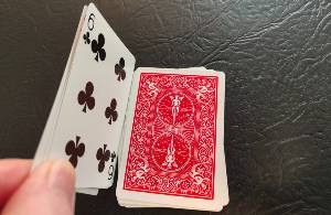 This pile is placed on top of the other two piles.