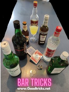 Image showing bottle, glasses and drinks for use in a bar trick.