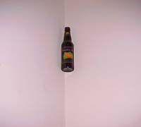 Pub trick where you make a beer bottle stick to a wall. This looks amazing.