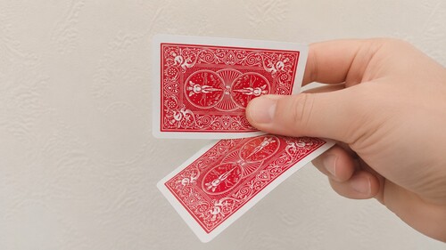 Front playing card sliding downward during the Snap Change