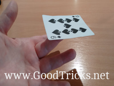 First finger is used to carefully spin the card around the middle finger.