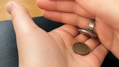 PK ring hand passing approximately two centimetres above the lower palm
