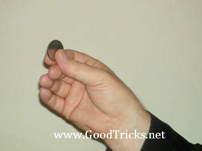 Coin is shown being pushed up.