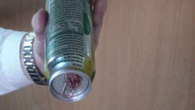 Coin appears to have travelled through a soda can.