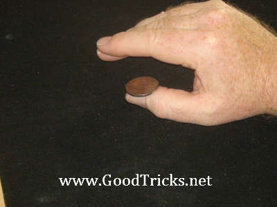 Coin is now balancing on thumb, ready to repeat the sequence again.