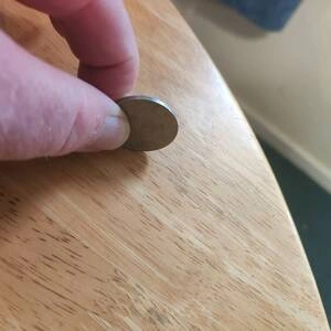 Coin Through Table