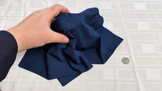 Covering the prepared glass with a napkin