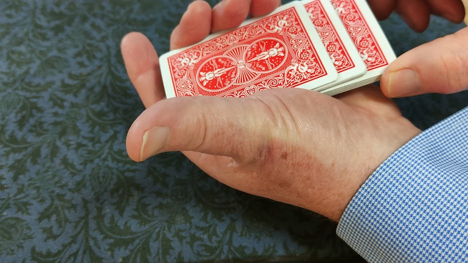 Controlling a chosen card to the top
