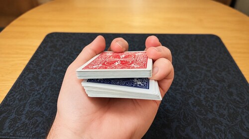 Spectator's selected card held in position by a pinky break