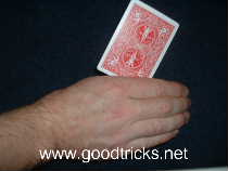 Move card forward as if reaching out to grab something from the air.