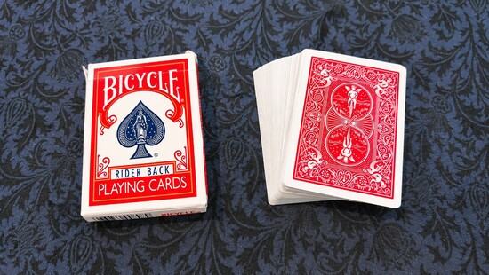 Deck of playing cards, with their box.