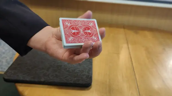 Slow-motion view of the cards being snatched from the deck
