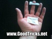 Open hand and catch other sugar packet in mid air.