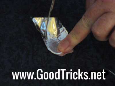 Carefully cut around the moulded coin shaped foil.
