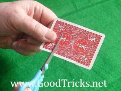Preparation of playing card showing where to cut the card.