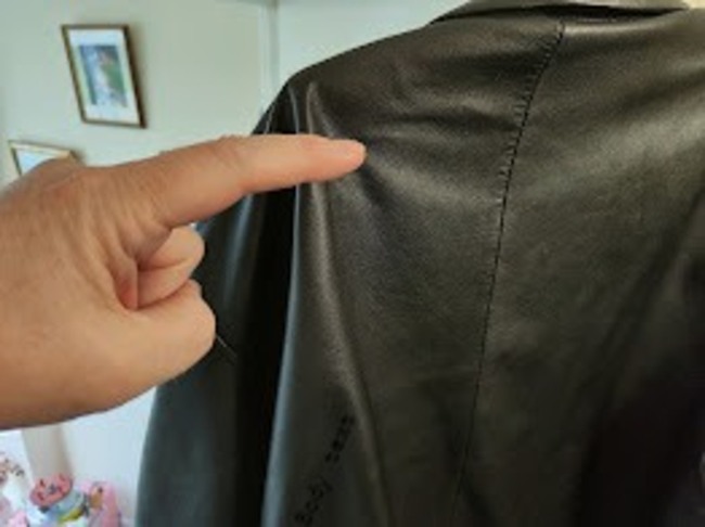 Performer apparently creating an invisible touch on a spectator