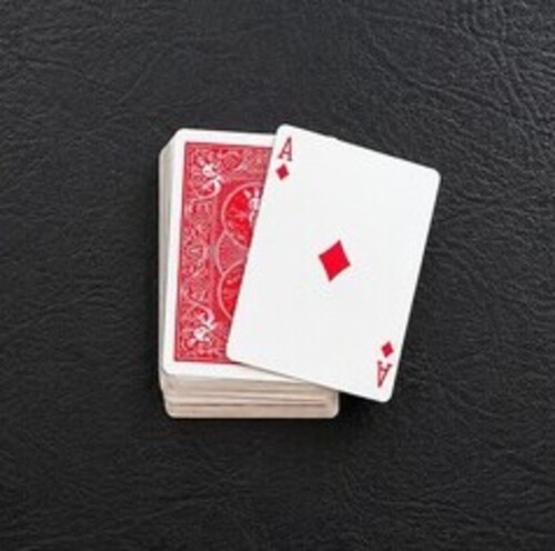 Playing card being dropped and flipped over.