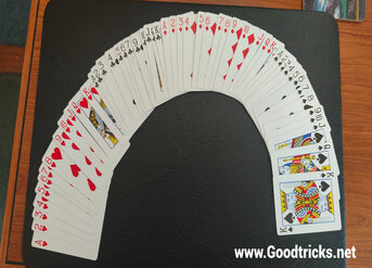 Deck of cards set up in new card order.