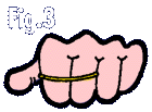 Hand turned palm down with rubber band secretly loaded across all four fingers