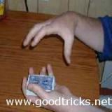 Hold deck in left hand as shown in photo