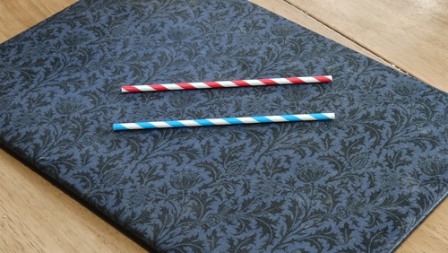 Two drinking straws ready for the penetration trick
