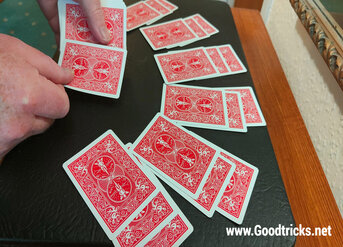 Each player is dealt a third card.